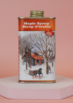 Three sizes of metal cans with maple syrup
