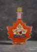 Amber maple syrup in leaf bottle