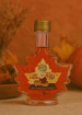 Amber maple syrup in leaf bottle