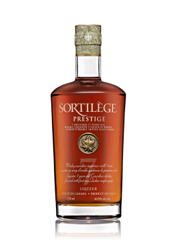 bottle of prestige spell 7 year old whiskey from canada