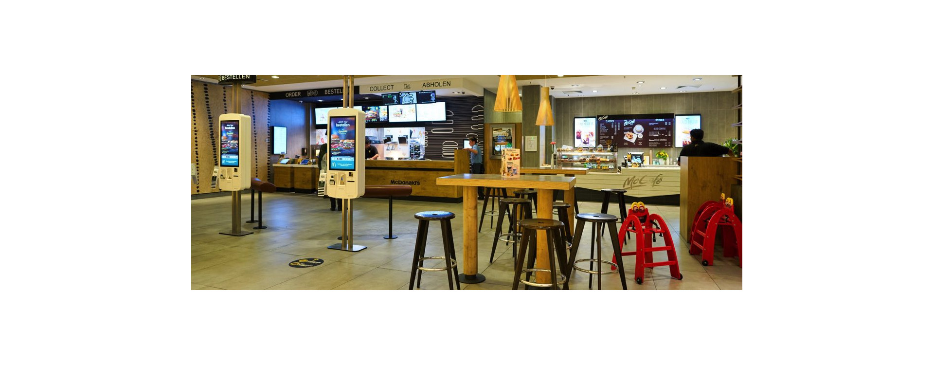How are order kiosks revolutionizing the dining experience in Canada?